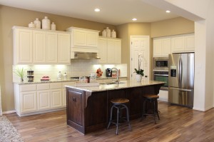 Burrows Cabinets kitchen in knotty alder with Verona finish and appliance end panels