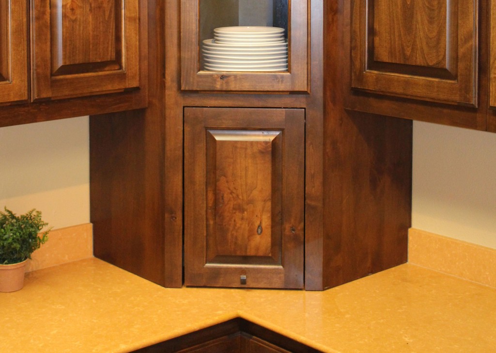 Corner appliance garage with tilt-up cabinet door