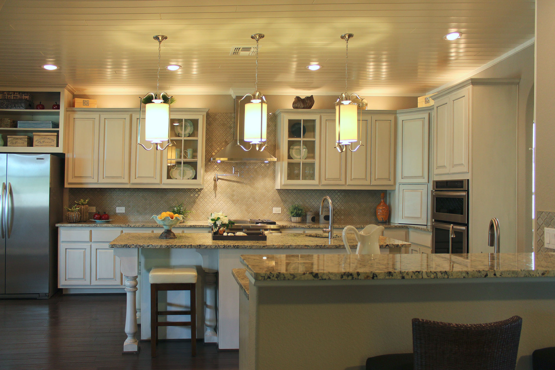 kitchen with glass doors with mullions and corner appliance garage in bone with black glaze