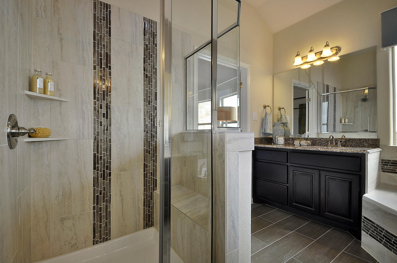 Burrows Cabinets primary bath vanity in Espresso with glass shower
