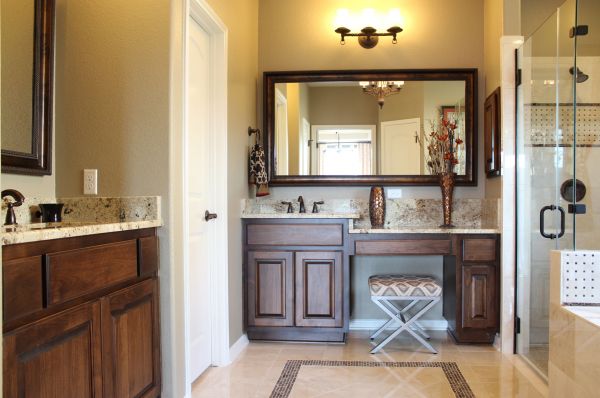 Master bathroom cabinets with chair space and alder cabinets