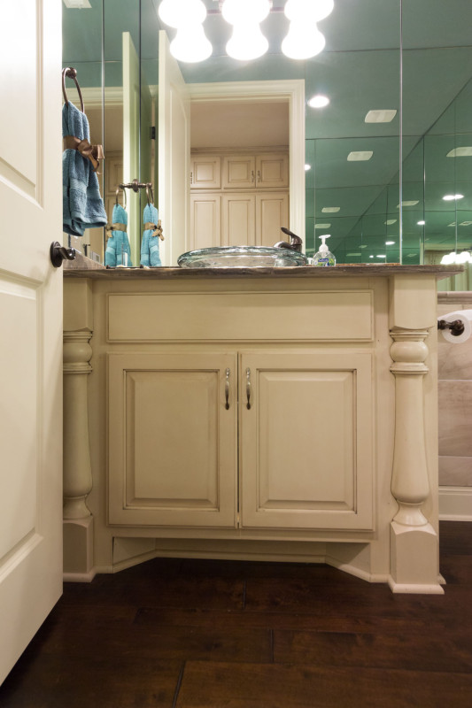 Burrows Cabinets' bathroom vanity with Monaco half round decorative posts