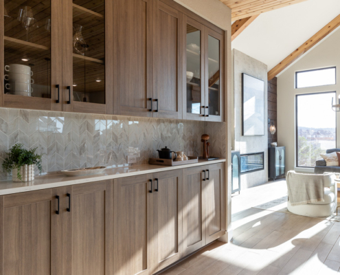 Buffet hutch in Reveur EVRGRN woodgrain with glass doors knotty wood shiplap ceiling