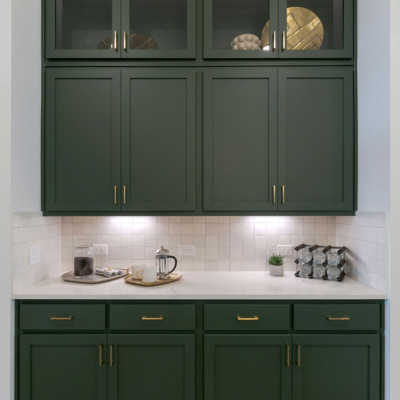 Buffet cabinets in Saba green with Shaker doors and glass uppers