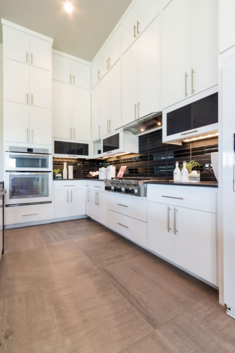 Burrows Cabinets' full overlay kitchen with modern white SoCo doors