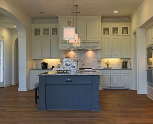 Burrows Cabinets' kitchen in bone with umber island