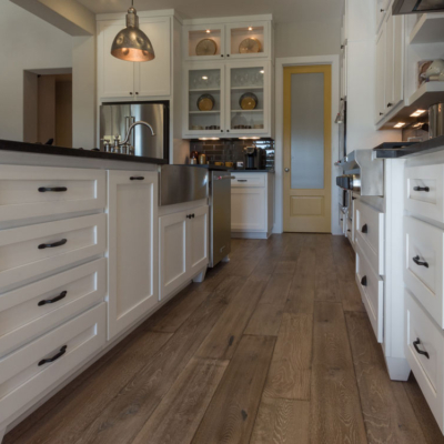 White kitchen base cabinets with banks of drawers