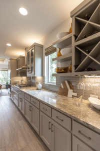 Wall cabinets with floating shelves and Big X wine rack