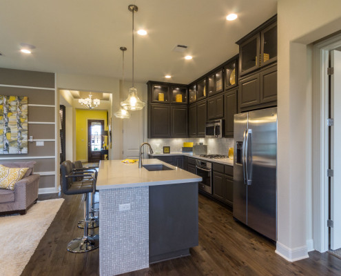 Burrows Cabinets' gray kitchen with raised panel doors