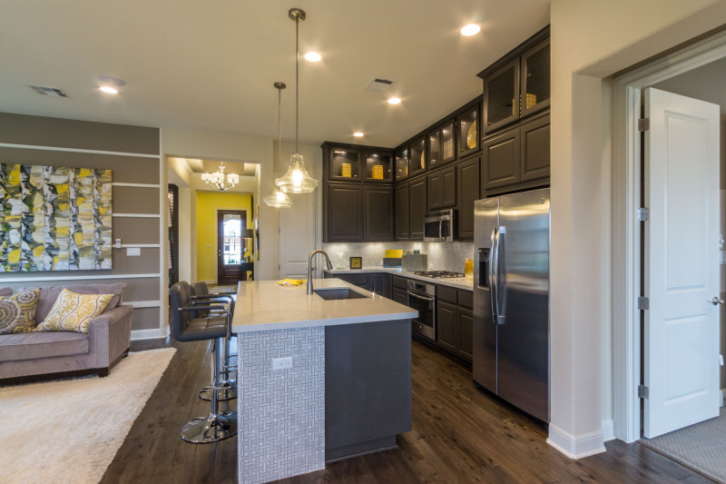 Burrows Cabinets' gray kitchen with raised panel doors