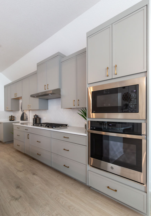 Kitchen perimeter cabinets with Slim Shaker doors in Bristol gray