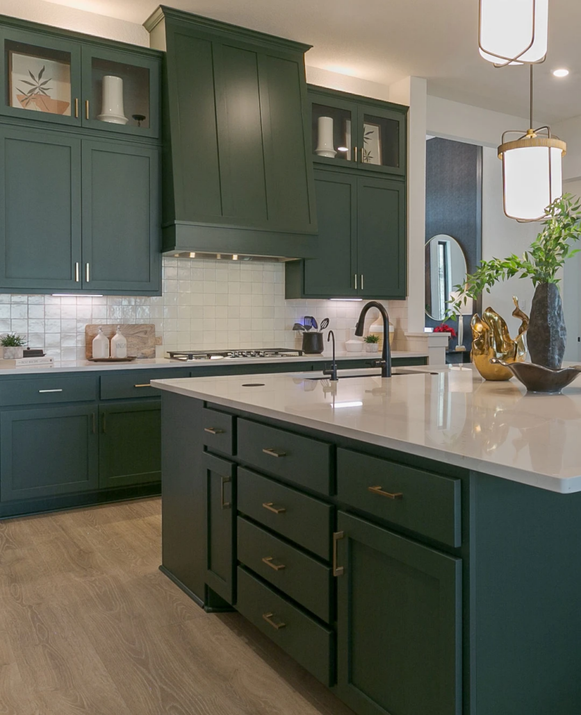 Kitchen with Shaker doors and Shaker vent hood in Saba green