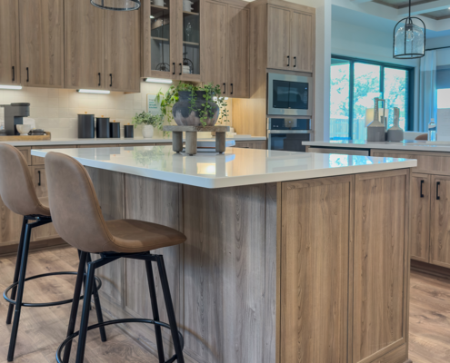 kitchen double islands with paneled sides and back in Roxen with Slim Shaker doors