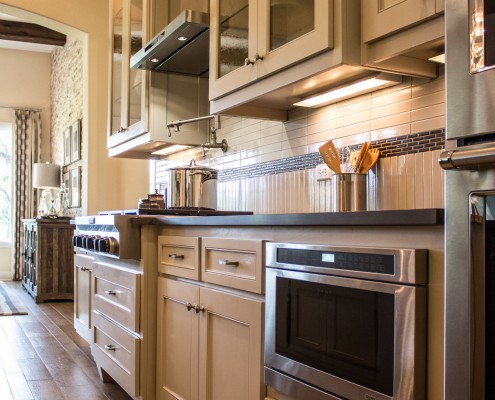 Burrows Cabinets' kitchen cabinets with Kensington flat panel doors