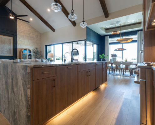 Kitchen Island in Reveur woodgrain with Slim Shaker doors and dishwasher appliance panel