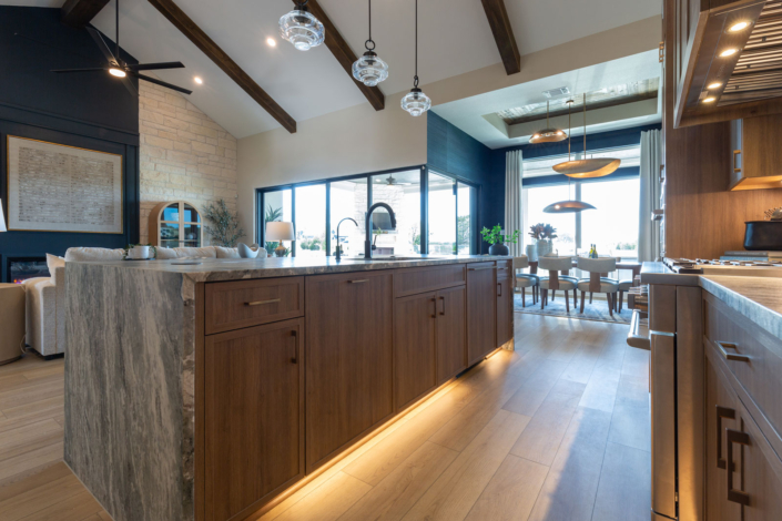 Kitchen Island in Reveur woodgrain with Slim Shaker doors and dishwasher appliance panel