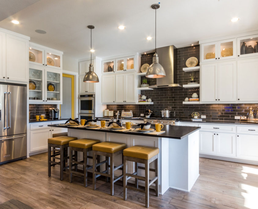 Burrows Cabinets' kitchen with Shaker doors in Bone white and floating shelves