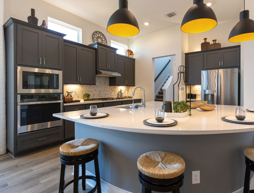 Kitchen in Greystone with Shaker doors and pie-shaped island