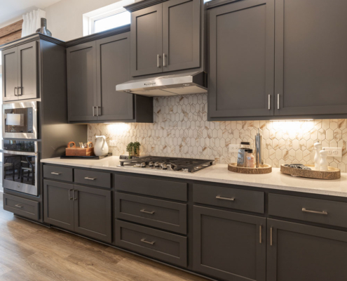 Kitchen wall cabinets in Greystone with Shaker Doors