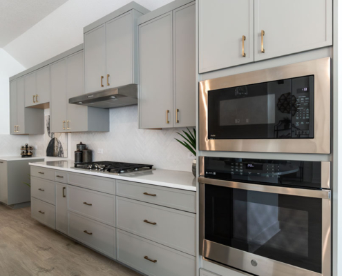 Kitchen perimeter cabinets with Slim Shaker doors in Bristol gray