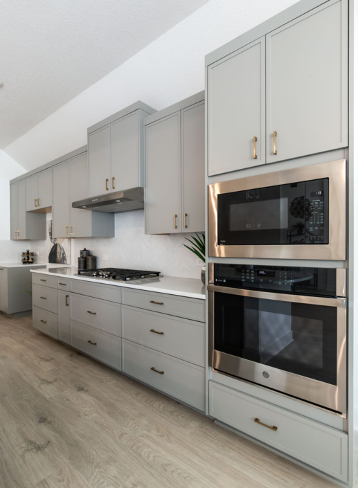 Kitchen perimeter cabinets with Slim Shaker doors in Bristol gray