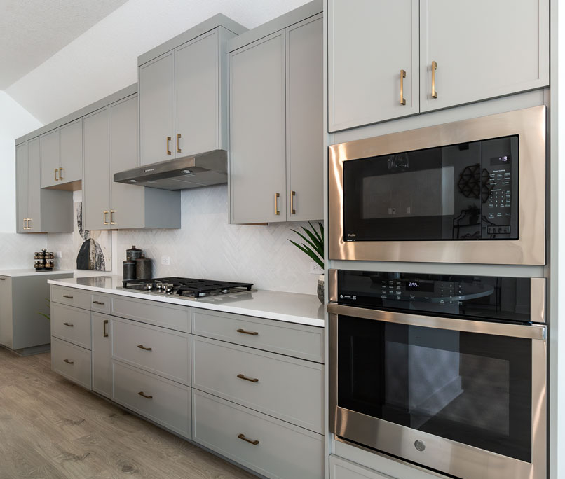 Kitchen perimeter cabinets with Slim Shaker doors in Bristol gray