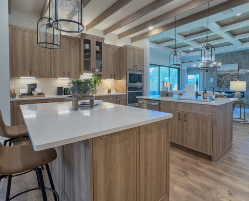 Kitchen in Roxen with Slim Shaker doors and matte black pulls and paneled double islands