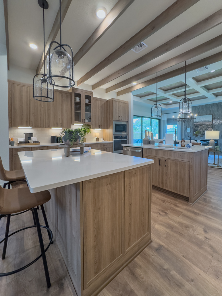Kitchen in Roxen with Slim Shaker doors and matte black pulls and paneled double islands