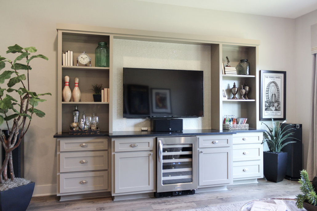 Grey media cabinet with wine storage and shaker doors