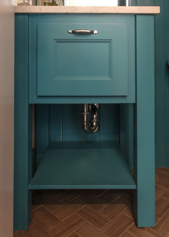 Burrows Cabinets' modern vanity in custom turquoise paint