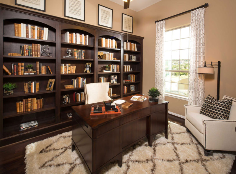 Study with built in bookshelves with Kona finish by Burrows Cabinets