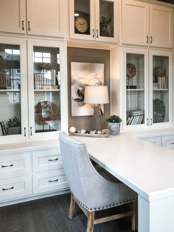 Burrows Cabinets' built-in study cabinets in Bone white with Terrazzo doors