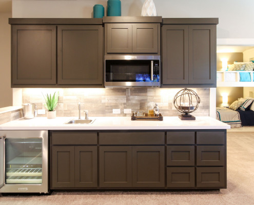 Burrows Cabinets' wet bar in Umber with Shaker doors